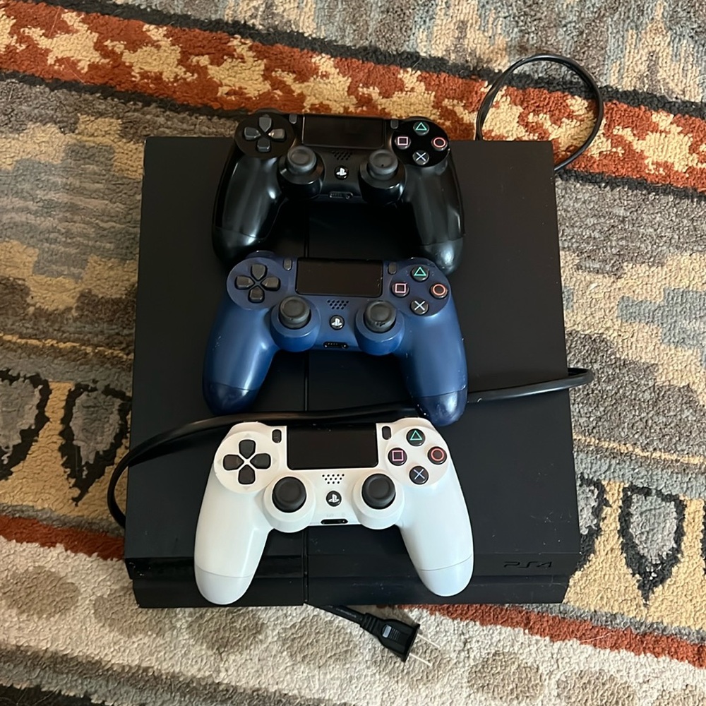 Sony PlayStation 4 with 3 Controllers